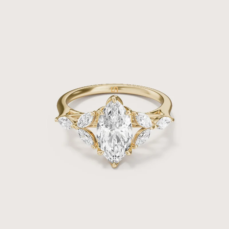 Round - cut diamond engagement ring with a twisted band design in 14K white goldFleur Marquise Side Stone Ring