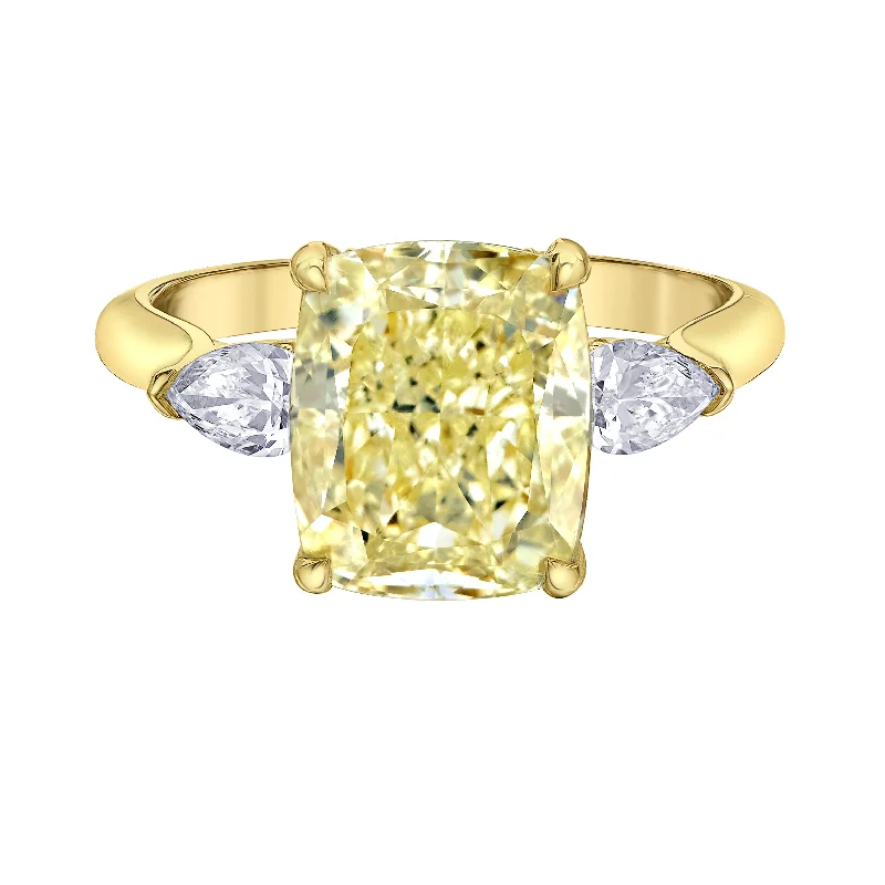 Art Deco - Inspired Women's Diamond Rings with Geometric Designs and Baguette - Cut DiamondsFancy Yellow Radiant Canadian Diamond Ring