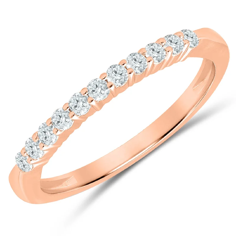 Round - cut diamond engagement ring with a twisted band design in 14K white goldSophisticated Prong Set Diamond Anniversary Band Set in Rose Gold, 0.25cttw