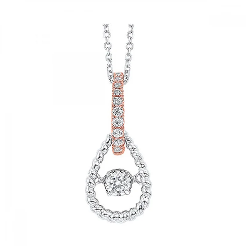 Ruby and diamond engagement ring with a halo of diamonds in 14K red goldWhite and Rose Gold ‘Rhythm of Love’ Diamond Pear Shaped Pendant Necklace, 0.10 cttw