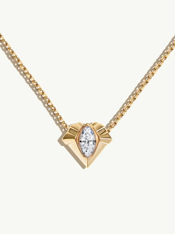 Emerald - cut diamond engagement ring set in a modern titanium bandAlexandria Pendant Necklace With 0.50CT Marquise-Cut Diamond In 18K Yellow Gold, 13mm