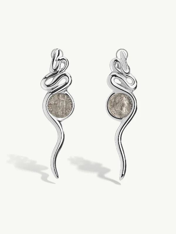 Halo diamond engagement ring in 18K white gold with a center oval - cut stoneAncient Roman Coin Serpentine Earrings In 18K White Gold