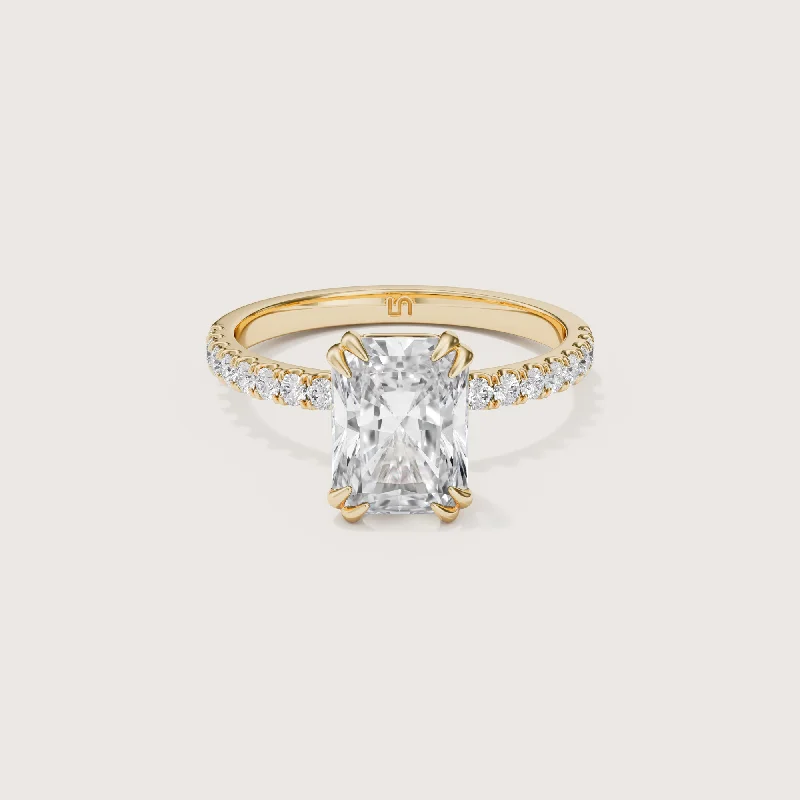 Marquise - cut diamond engagement ring with a split - shank band in platinumLotus Radiant Solitaire - Diamond Band