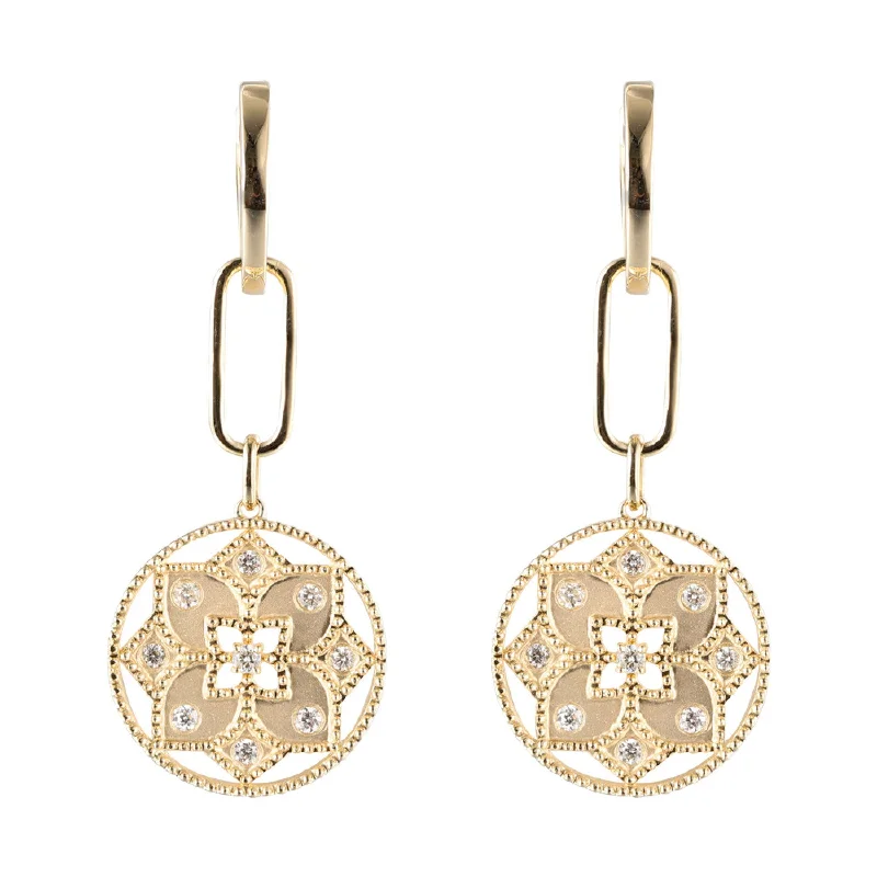 Three - stone diamond engagement ring in rose gold, symbolizing past, present, and futureFlower Medallion Dangle Earrings