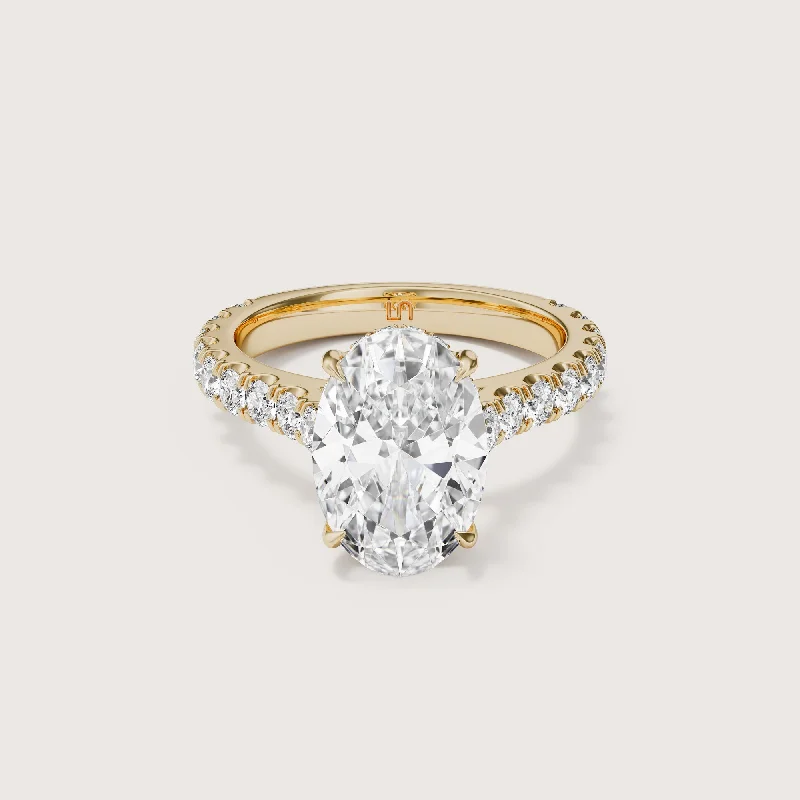 Marquise - cut diamond engagement ring with a split - shank band in platinumCasa Oval Solitaire - Diamond Band