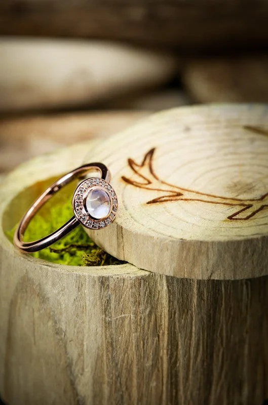 Men's Tanzanite Engagement Rings in Palladium with a Three - Stone ArrangementROUND CUT MOONSTONE ENGAGEMENT RING WITH DIAMOND HALO