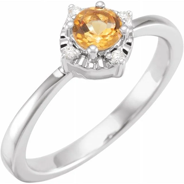 Aquamarine and diamond engagement ring in a 18K white - gold setting with a scalloped edgeCitrine Ring with Diamonds