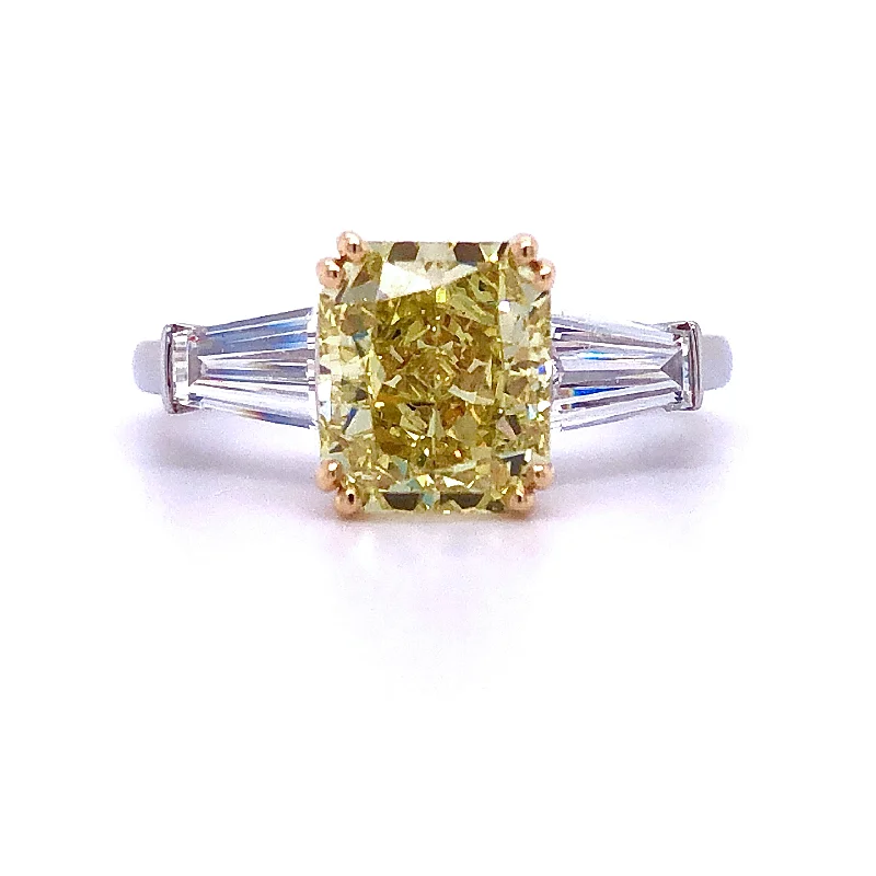 Marquise - Cut Women's Diamond Rings in Palladium for a Unique and Elongated ShapeRadiant Cut Yellow Diamond Ring with Tapered Baguette Accents