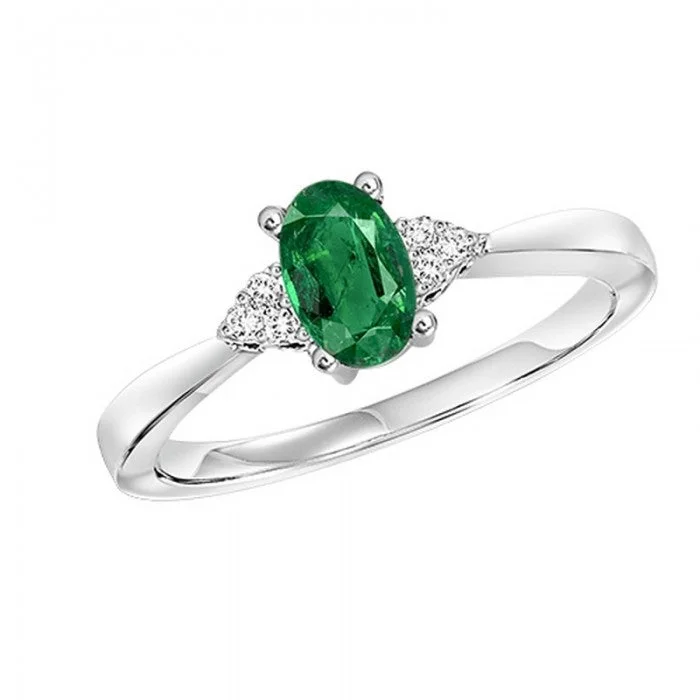 Halo diamond engagement ring in 18K white gold with a center oval - cut stoneEmerald Ring with Diamond Accents