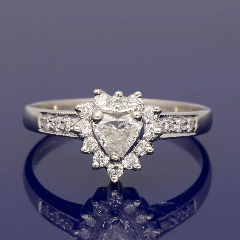 Marquise - Cut Women's Diamond Rings in Palladium for a Unique and Elongated ShapePlatinum Heart Shape Diamond Halo Ring