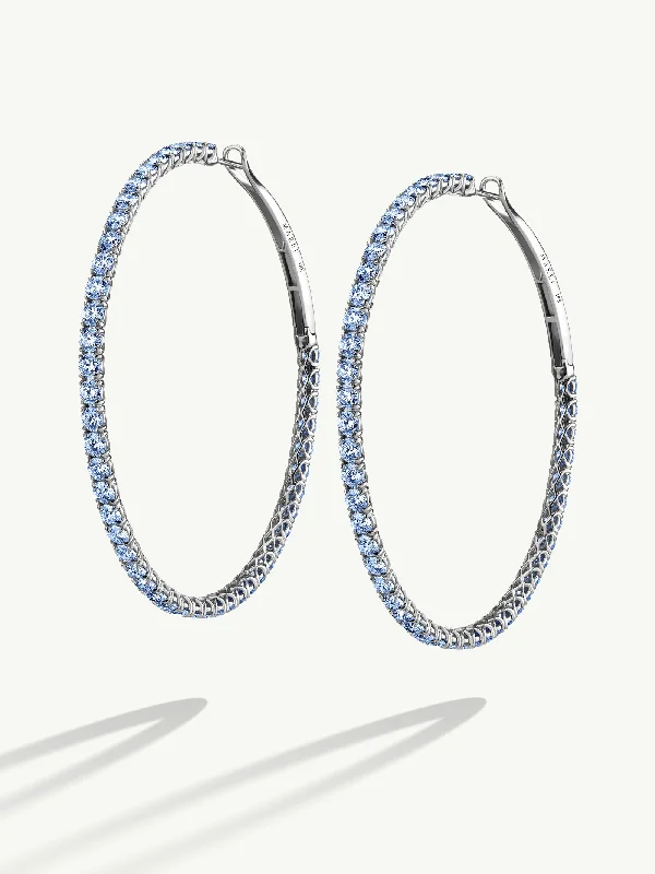 Pink diamond engagement ring in a rose - gold band with white - gold accentsSeraphina XL Hoop Earrings With Brilliant-Cut Blue Sapphires In 18K White Gold