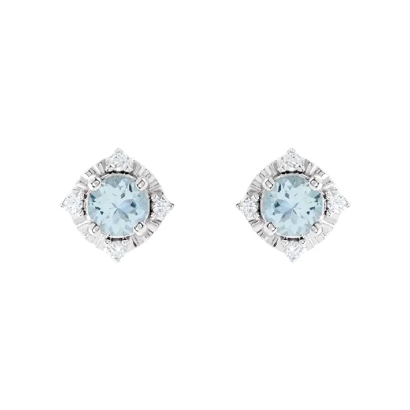 Emerald - cut diamond engagement ring set in a modern titanium bandAquamarine Earrings with Diamonds