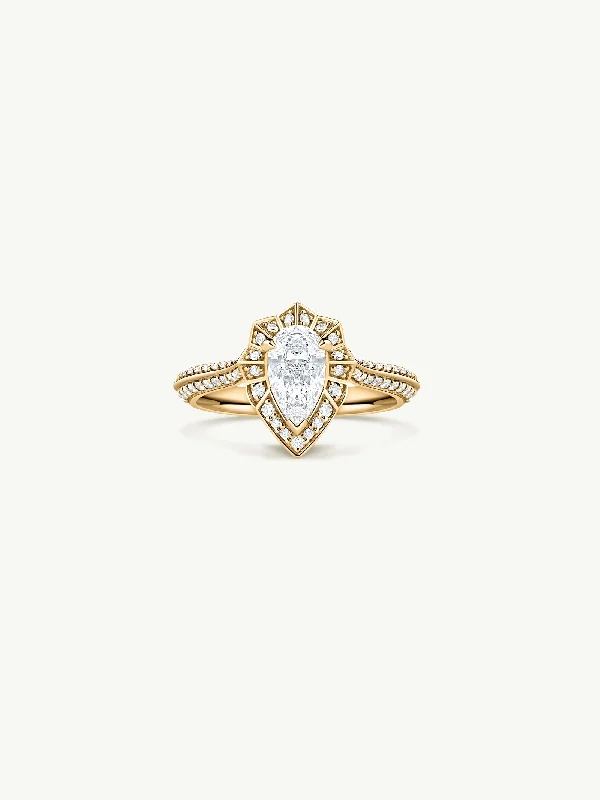 Three - stone diamond engagement ring in rose gold, symbolizing past, present, and futureAtara Engagement Ring With Brilliant-Cut Pear-Shaped White Diamond In 18K Yellow Gold