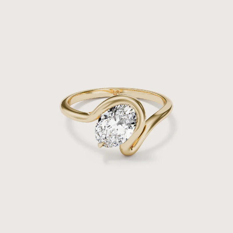 Pear - shaped diamond engagement ring with side baguette diamonds in 18K goldBloom Oval Half Bezel Solitaire