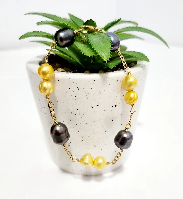 Bangle Sets with Mix - and - Match Patterns for a Versatile AccessoryTarsel - Mixture of Natural Premium Yellow Freshwater and Black Pearls Bracelet