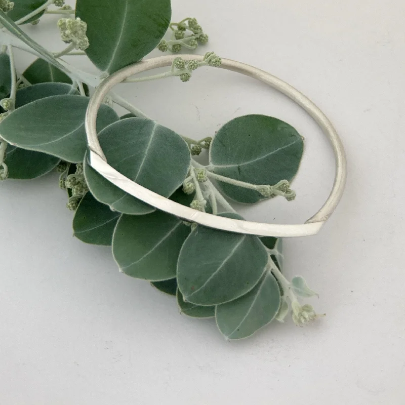 Solid Gold Bangles with Intricate Floral Engravings for a Luxurious LookSquare curve sterling silver bangle