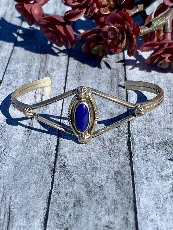 Adjustable Women's Elastic Cuff Bracelets with Pearl Accents for a Feminine TouchRoger Pino Lapis & Sterling Silver Cuff Bracelet