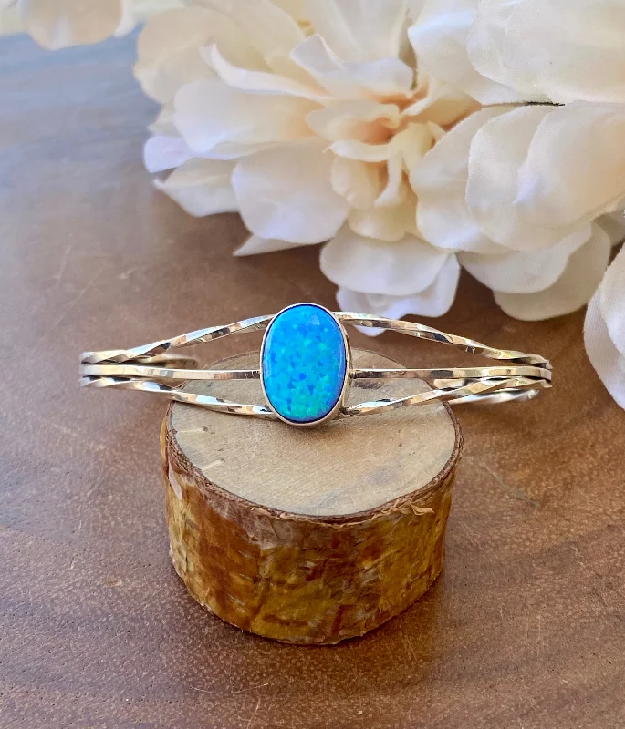 Adjustable Women's Elastic Cuff Bracelets with Pearl Accents for a Feminine TouchMark Barney Blue Opal & Sterling Silver Cuff Bracelet