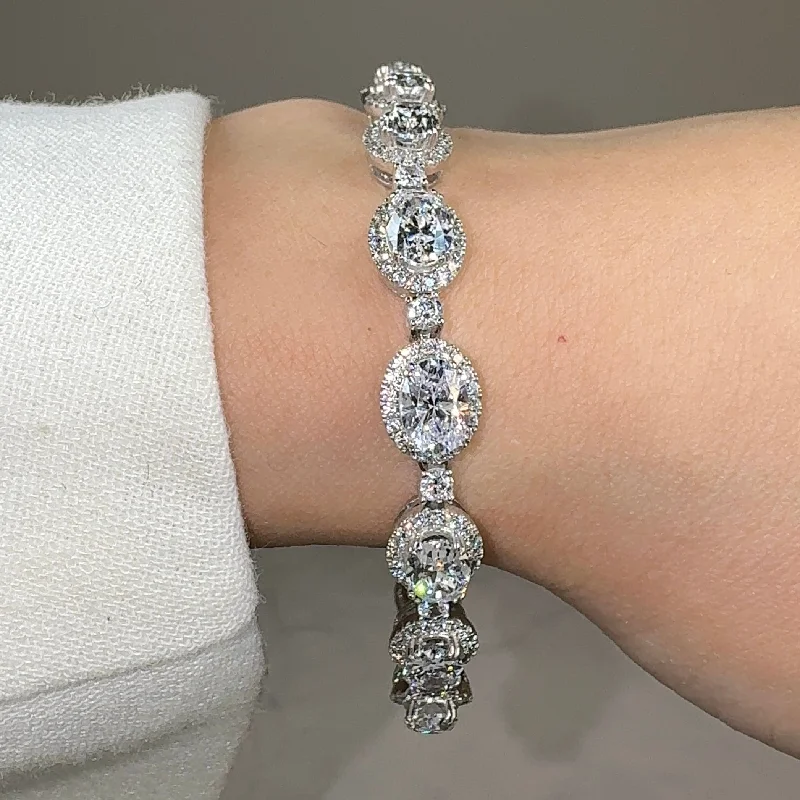 Children's Bangle Bracelets with Animal - Shaped Charms for a Cute AccessoryOval Shape Halo 9 Carat Diamond Bracelet BRHAOC