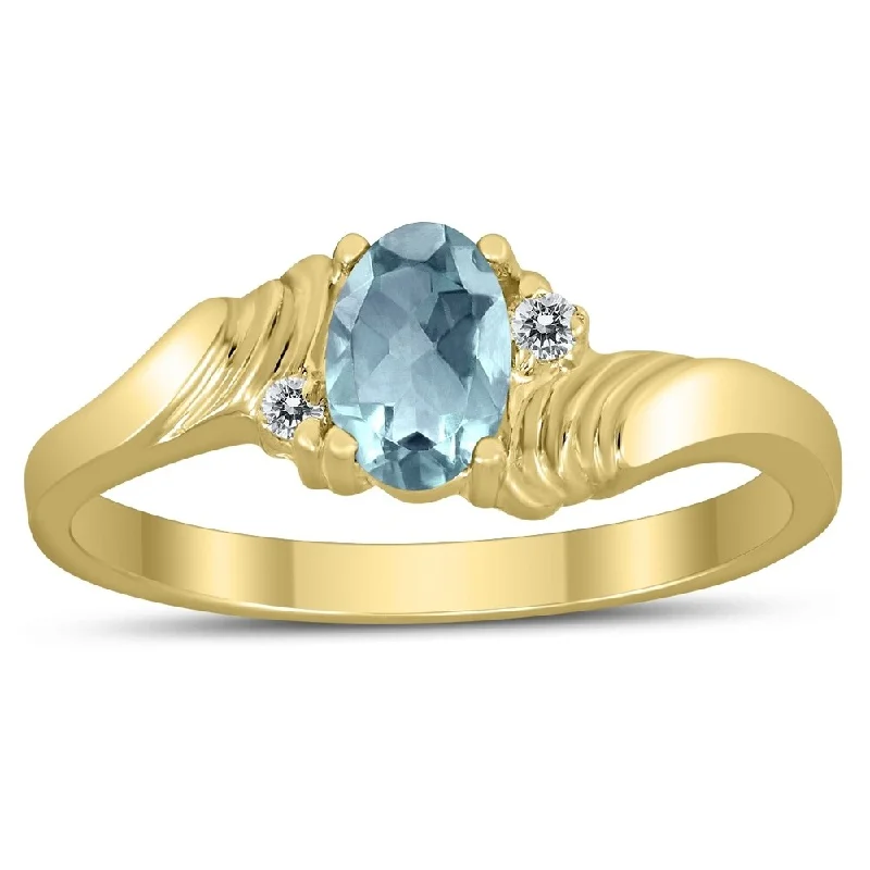 Iolite Gemstone Rings in 10K Gold with a Twisted Band for a Distinctive and Stylish Accessory6X4MM Aquamarine and Diamond Wave Ring in 10K Yellow Gold