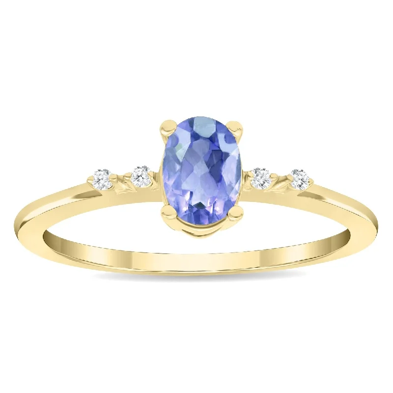 Aquamarine Gemstone Rings in 9K Gold with a Bezel Setting for a Modern and Secure FitWomen's Oval Shaped Tanzanite and Diamond Sparkle Ring in 10K Yellow Gold