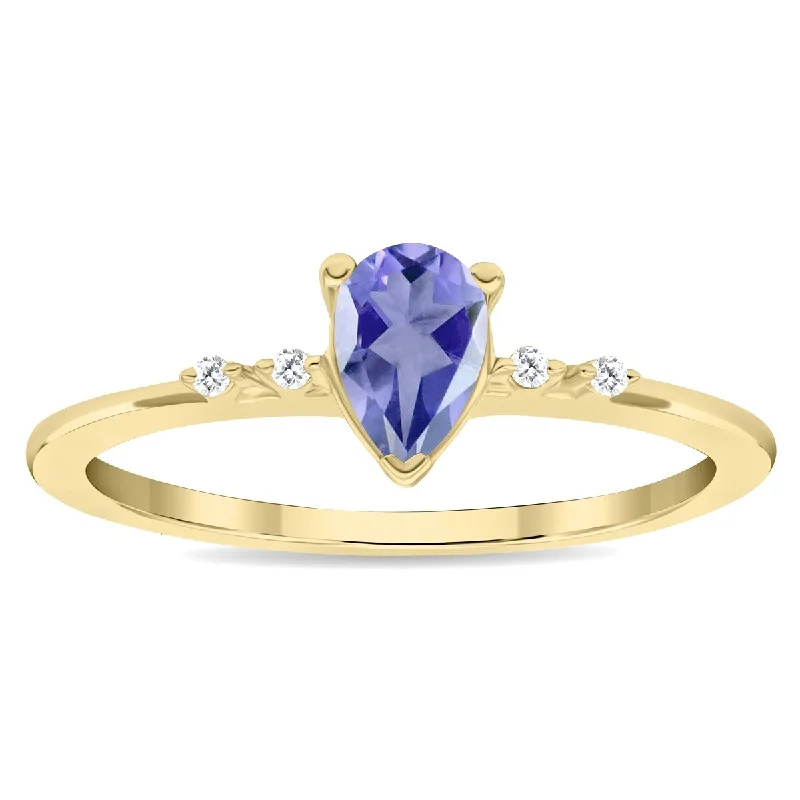 Opal Gemstone Rings in Rose Gold with a Milgrain Edge for a Feminine and Romantic StyleWomen's Pear Shaped Tanzanite and Diamond Sparkle Ring in 10K Yellow Gold