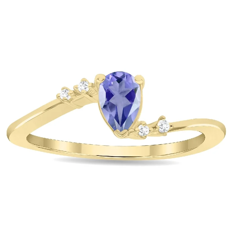 Sapphire Gemstone Rings in 18K White Gold with Diamond Accents for an Elegant EngagementWomen's Pear Shaped Tanzanite and Diamond Wave Ring in 10K Yellow Gold