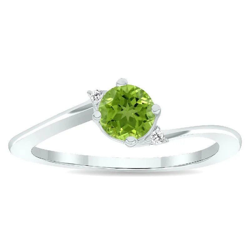 Ruby Gemstone Rings in 14K Yellow Gold with a Solitaire Setting for a Classic and Bold StatementWomen's Peridot and Diamond Wave Ring in 10K White Gold