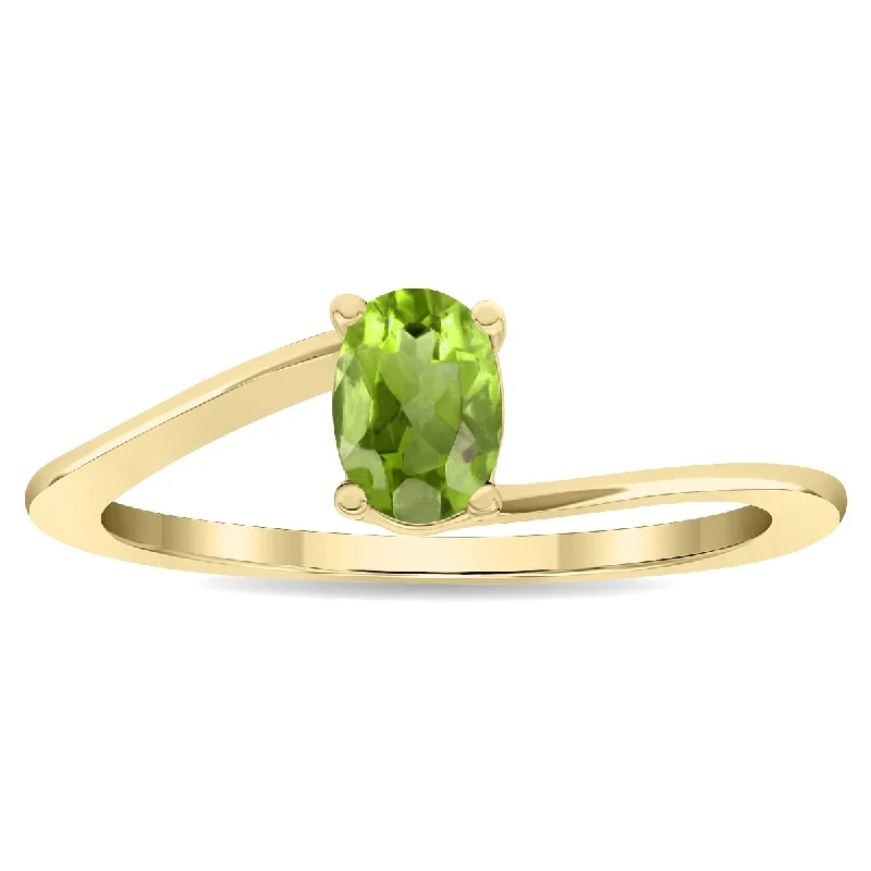 Ruby Gemstone Rings in 14K Yellow Gold with a Solitaire Setting for a Classic and Bold StatementWomen's Solitaire Oval Shaped Peridot Wave Ring in 10K Yellow Gold