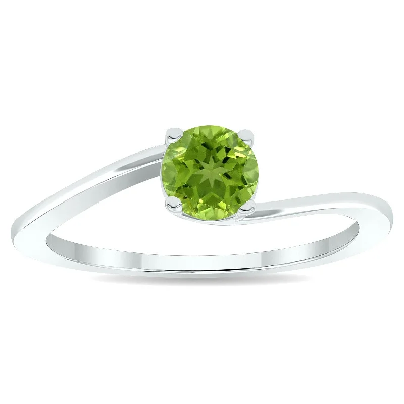 Ruby Gemstone Rings in 14K Yellow Gold with a Solitaire Setting for a Classic and Bold StatementWomen's Solitaire Peridot Wave Ring in 10K White Gold