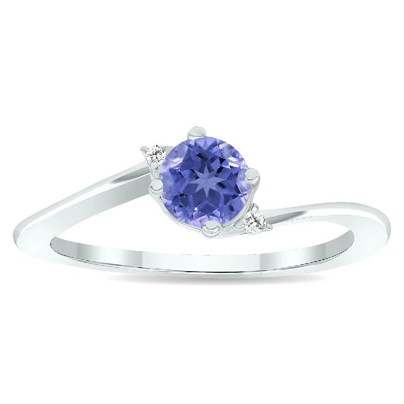 Sapphire Gemstone Rings in 18K White Gold with Diamond Accents for an Elegant EngagementWomen's Tanzanite and Diamond Wave Ring in 10K White Gold